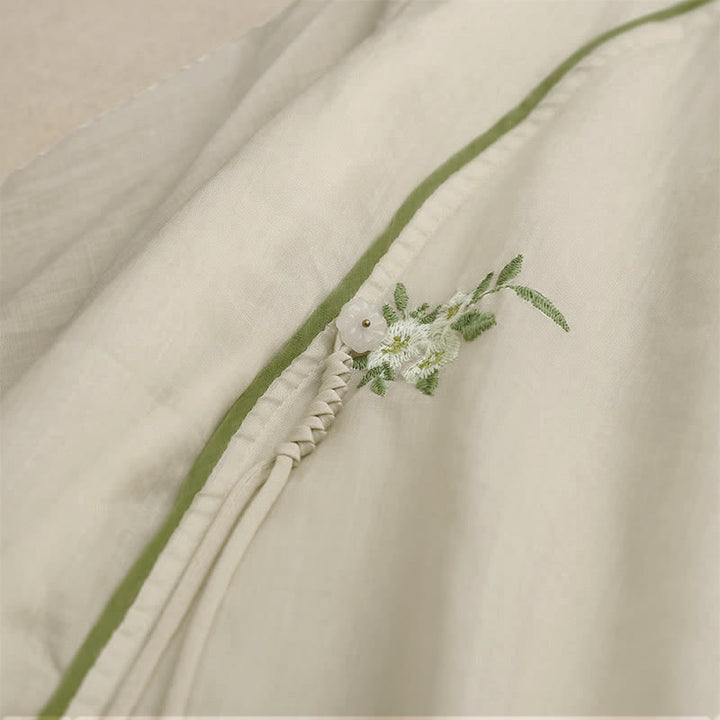 Damen-Shirt mit Buddha Stones, beigefarbenem Blumenmuster und grüner Blattstickerei, Rundhalsausschnitt und Dreiviertelärmeln - image 4