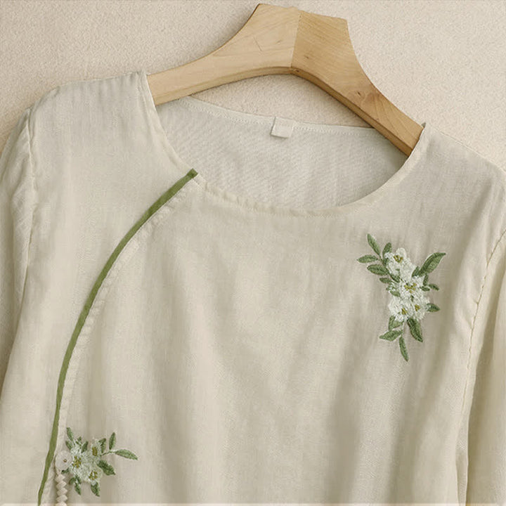 Damen-Shirt mit Buddha Stones, beigefarbenem Blumenmuster und grüner Blattstickerei, Rundhalsausschnitt und Dreiviertelärmeln - image 2