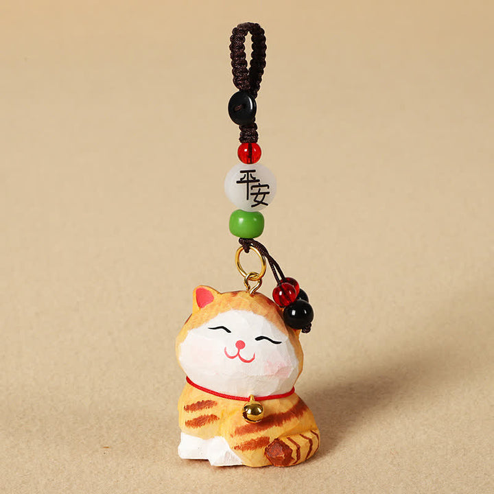 Buddha Stones Schlüsselanhänger mit geschnitzter Katze aus Holz, Om Mani Padme Hum Focus - Friedliche orange Katze - image 2
