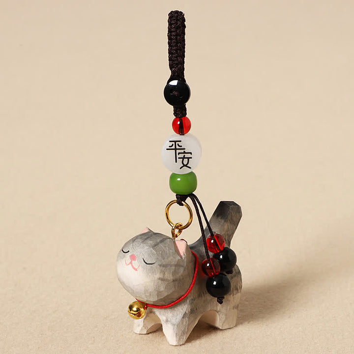Buddha Stones Schlüsselanhänger mit geschnitzter Katze aus Holz, Om Mani Padme Hum, Frieden - Friedliche graue Katze - image 1