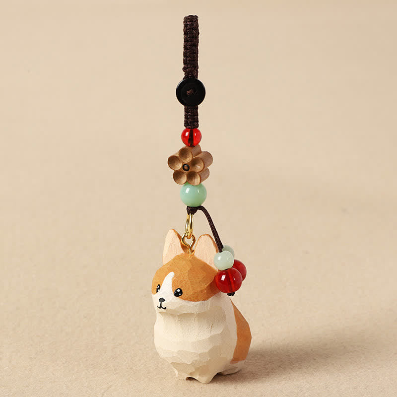 Buddha Stones Schlüsselanhänger mit geschnitztem Corgi-Motiv und dem Aufdruck „Om Mani Padme Hum Peace“ - image 1