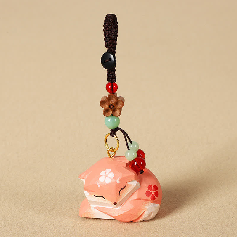 Buddha Stones Schlüsselanhänger mit geschnitztem Fuchs aus Holz und den Weisheitssymbolen Om Mani Padme Hum - image 1