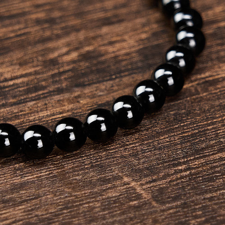 Buddha Stones Schwarzes Obsidian- und Turmalin-Schutzarmband, minimalistisch, mit runden Perlen - image 4