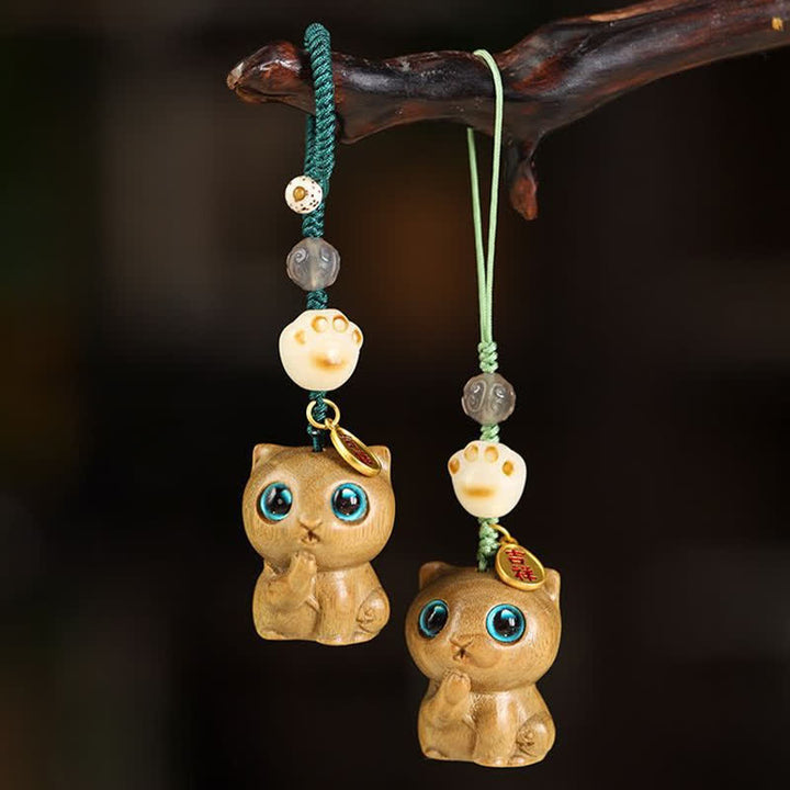Buddha Stones Beruhigende Schlüsselanhänger aus grünem Sandelholz mit Katzenmotiv, handgewebt - image 0