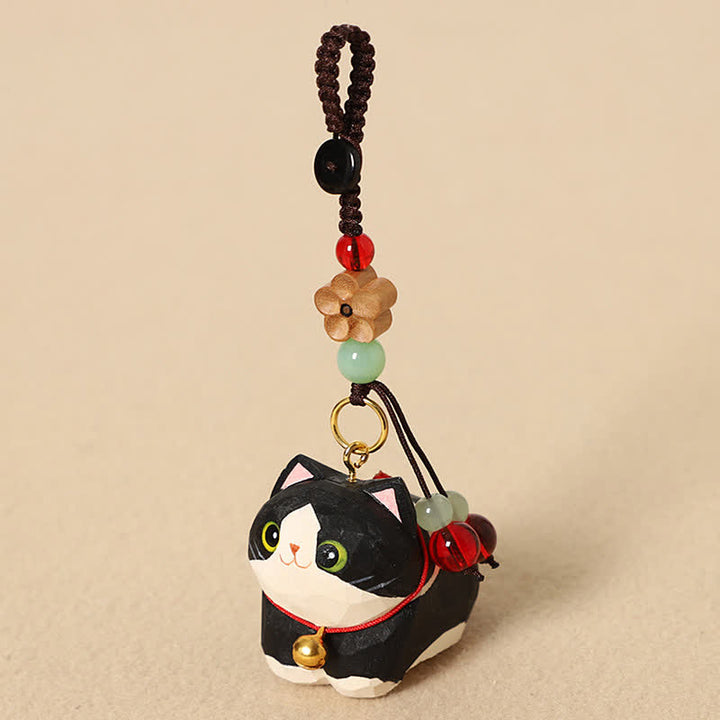 Buddha Stones Schlüsselanhänger aus Naturholz, handgeschnitzt, liegende Katze, Om Mani Padme Hum, Frieden - Schwarze Katze Pflaumenblüte - image 3