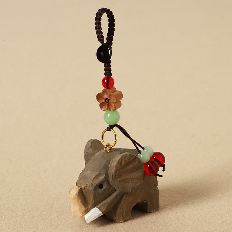 Buddha Stones Schlüsselanhänger mit Elefantenmotiv aus Naturholz – Frieden, Om Mani Padme Hum, Reinheit - Elefantenpflaumenblüte - image 1