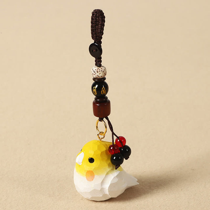 Buddha Stones Handgeschnitzte Schlüsselanhänger aus Naturholz mit Nymphensittichmotiv und den Aufschriften „Om Mani Padme Hum Focus“ - Nymphensittich Om Mani Padme Hum - image 0