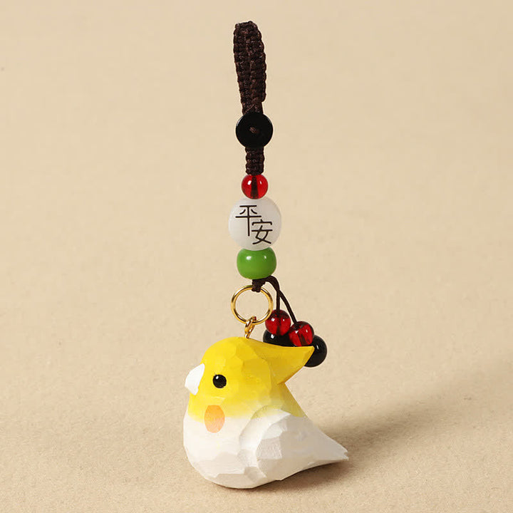 Buddha Stones Handgeschnitzte Schlüsselanhänger aus Naturholz mit Nymphensittichmotiv und den Aufschriften „Om Mani Padme Hum Focus“ - Nymphensittich Frieden - image 3