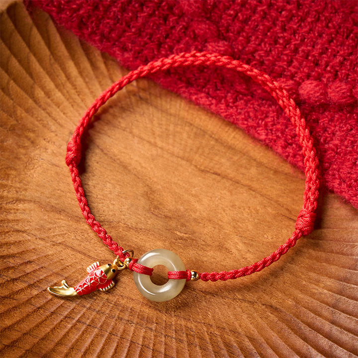 Buddha Stones Koi-Fisch-Anhänger Friedensschnalle Jade-rotes Schnur-Schutzarmband - Natürlicher Jade (Farbe kann variieren) - 16-18 cm - image 0