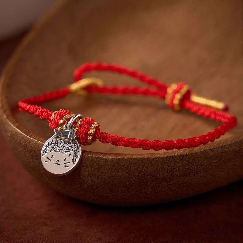 Buddha Stones Runder Anhänger aus 925er Sterlingsilber mit Kätzchen, das einen Fisch frisst, und passendes Armband aus geflochtenem Band (rot/schwarz) – ein Symbol für Wohlstand. - image 1