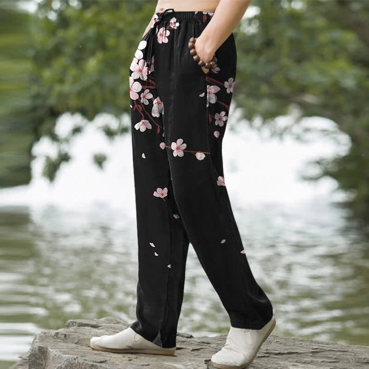 Buddha Stones Herrenhose aus Baumwolle mit rosa Kirschblütenmuster, schmal zulaufendem Schnitt und Taschen - image 1