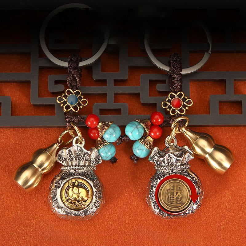 Buddha Stones Chinesischer Tierkreiszeichen-Schlüsselanhänger mit drehbarem Glücksbeutel und geflochtenem Muster - image 10
