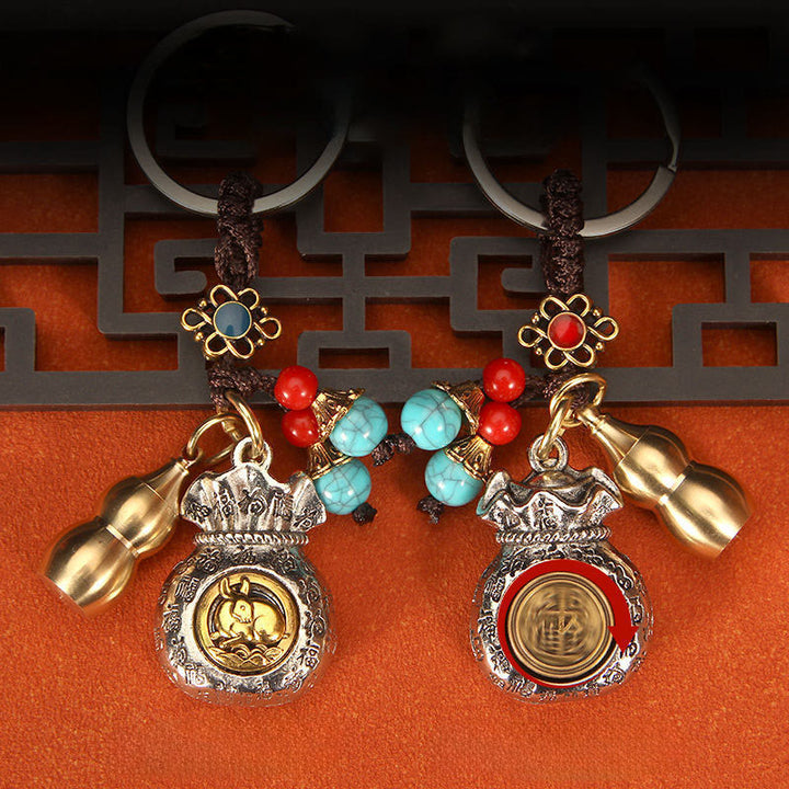 Buddha Stones Chinesischer Tierkreiszeichen-Schlüsselanhänger mit drehbarem Glücksbeutel und geflochtenem Muster - image 10