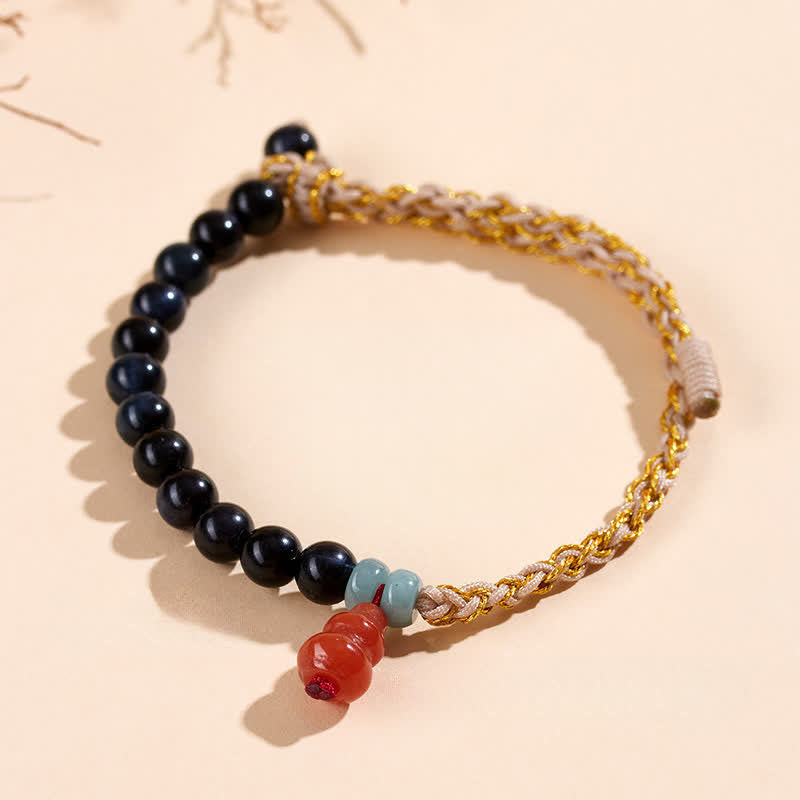 Buddha Stones Handgewebtes Armband aus blauem Tigerauge - image 1