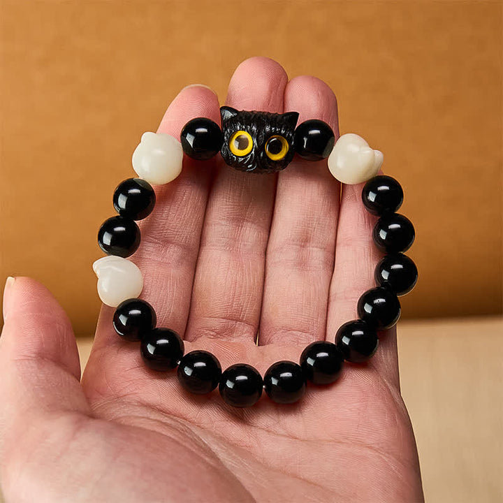 Buddha Stones Handgeschnitztes Armband aus schwarzem Obsidian mit gelbem Katzenkopf und Erdungsperlen - image 5