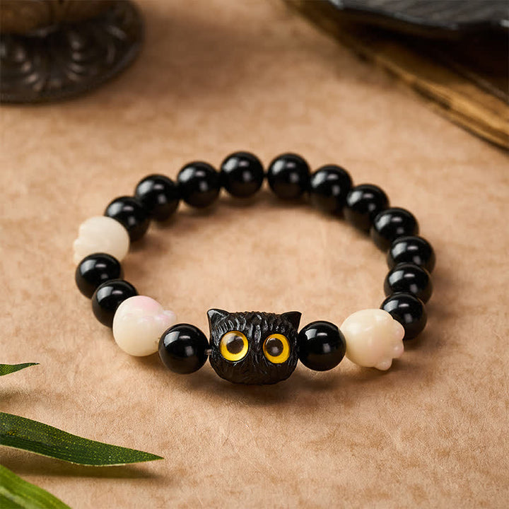 Buddha Stones Handgeschnitztes Armband aus schwarzem Obsidian mit gelbem Katzenkopf und Erdungsperlen - image 1
