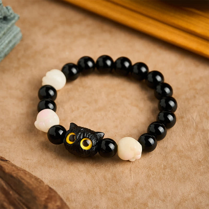 Buddha Stones Handgeschnitztes Armband aus schwarzem Obsidian mit gelbem Katzenkopf und Erdungsperlen - Schwarzer Obsidian (Reinigung ♥ Stärke) (Handgelenkumfang: 16–17 cm) - image 0