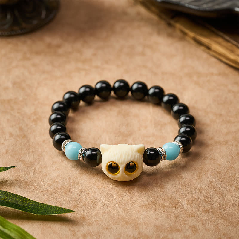 Buddha Stones Schwarzes Obsidian-Armband mit handgeschnitztem Relief einer Katze mit großem Auge - image 15