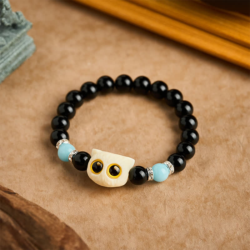 Buddha Stones Schwarzes Obsidian-Armband mit handgeschnitztem Relief einer Katze mit großem Auge - image 20