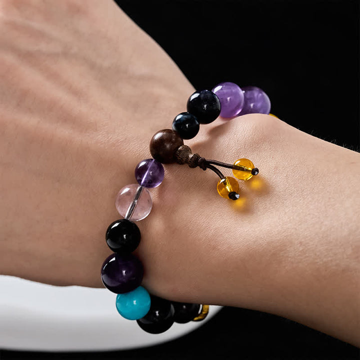 Buddha Stones Tibetisches Balance-Armband mit 18 Perlen aus Amethyst und Tigerauge - image 5