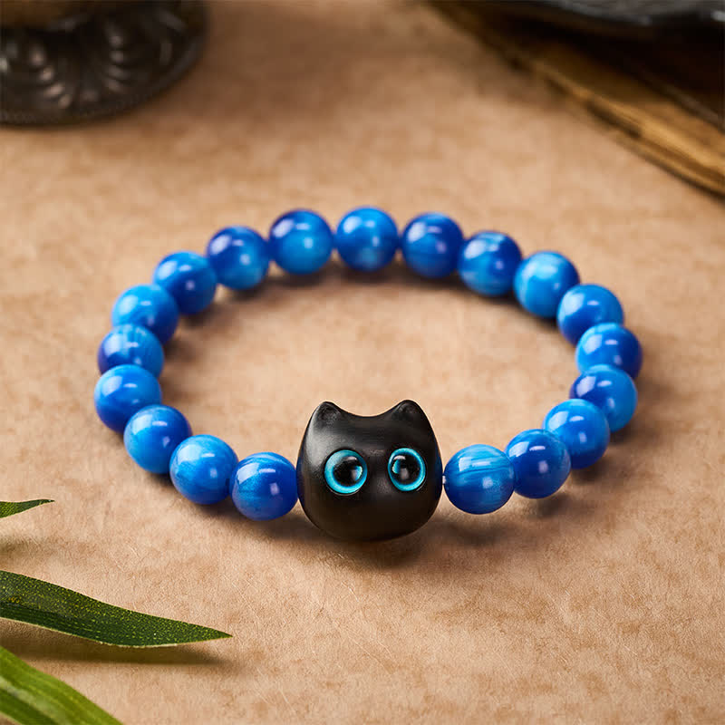 Buddha Stones Balance-Armband aus blauen Harzperlen und Ebenholz mit Katzenmotiv - image 10