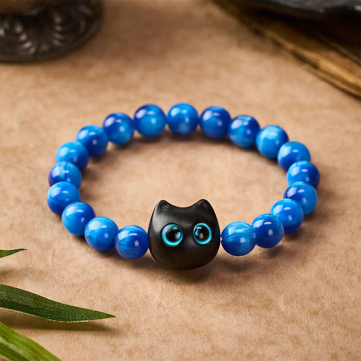 Buddha Stones Balance-Armband aus blauen Harzperlen und Ebenholz mit Katzenmotiv - image 10
