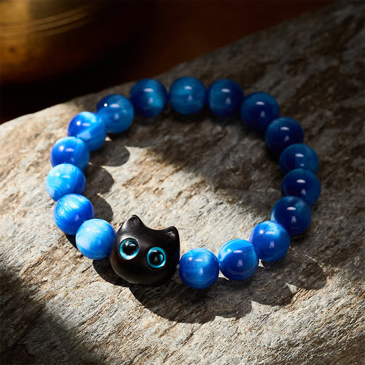 Buddha Stones Balance-Armband aus blauen Harzperlen und Ebenholz mit Katzenmotiv - image 3