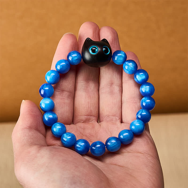 Buddha Stones Balance-Armband aus blauen Harzperlen und Ebenholz mit Katzenmotiv - image 14