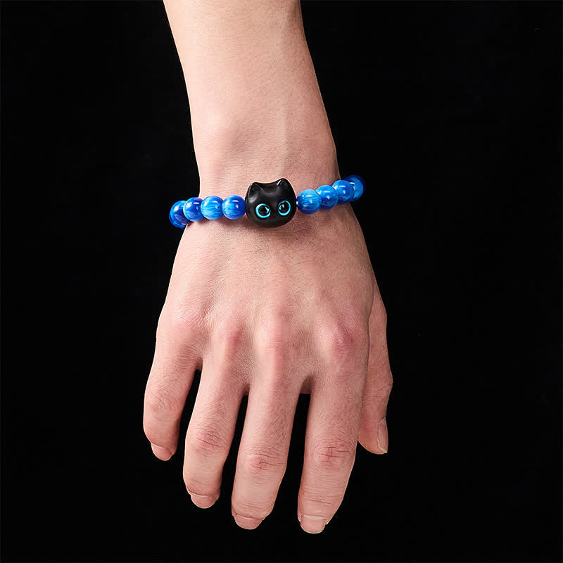 Buddha Stones Balance-Armband aus blauen Harzperlen und Ebenholz mit Katzenmotiv - image 13