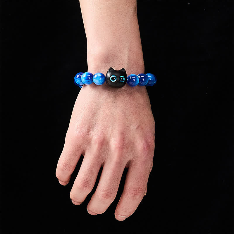 Buddha Stones Balance-Armband aus blauen Harzperlen und Ebenholz mit Katzenmotiv - image 4