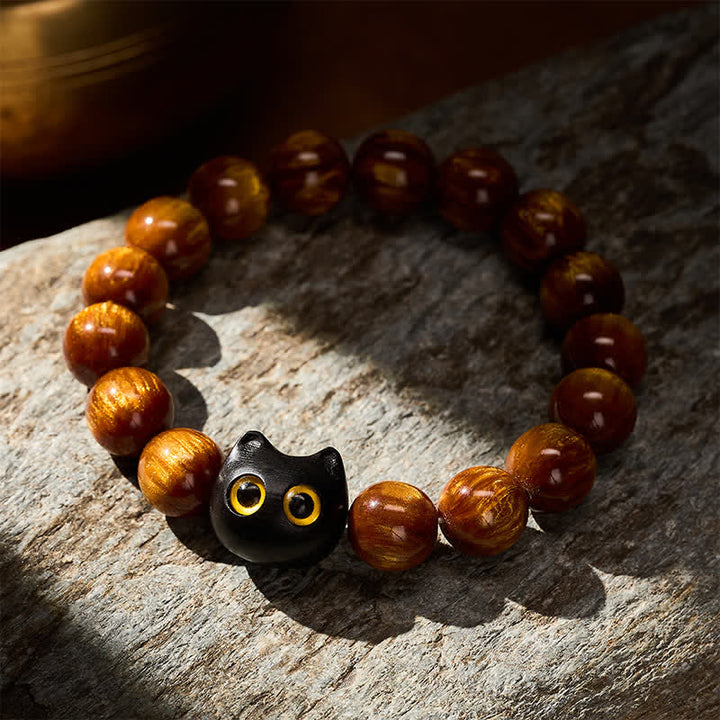 Buddha Stones Armband mit gelben Harzperlen, gelben Augen und Katzenmotiv aus Ebenholz - image 3