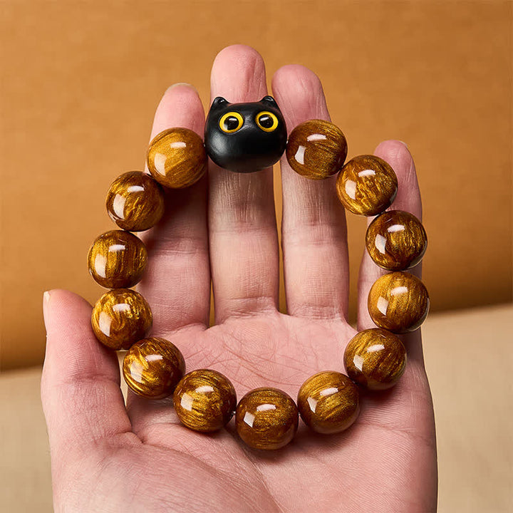 Buddha Stones Armband mit gelben Harzperlen, gelben Augen und Katzenmotiv aus Ebenholz - image 13