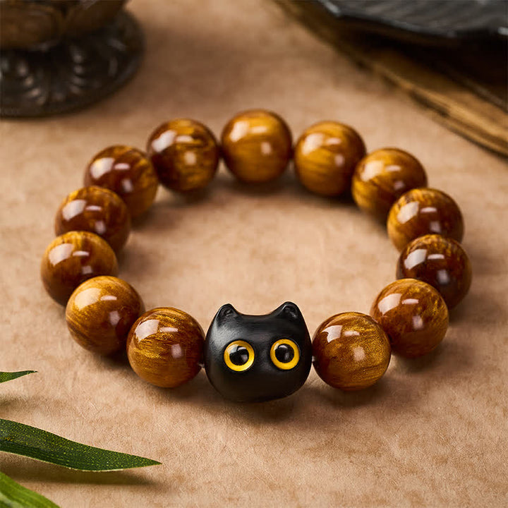 Buddha Stones Armband mit gelben Harzperlen, gelben Augen und Katzenmotiv aus Ebenholz - image 10