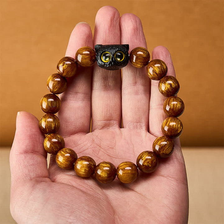 Buddha Stones Armband aus gelben Harzperlen und Ebenholz mit Katzenmotiv - image 13