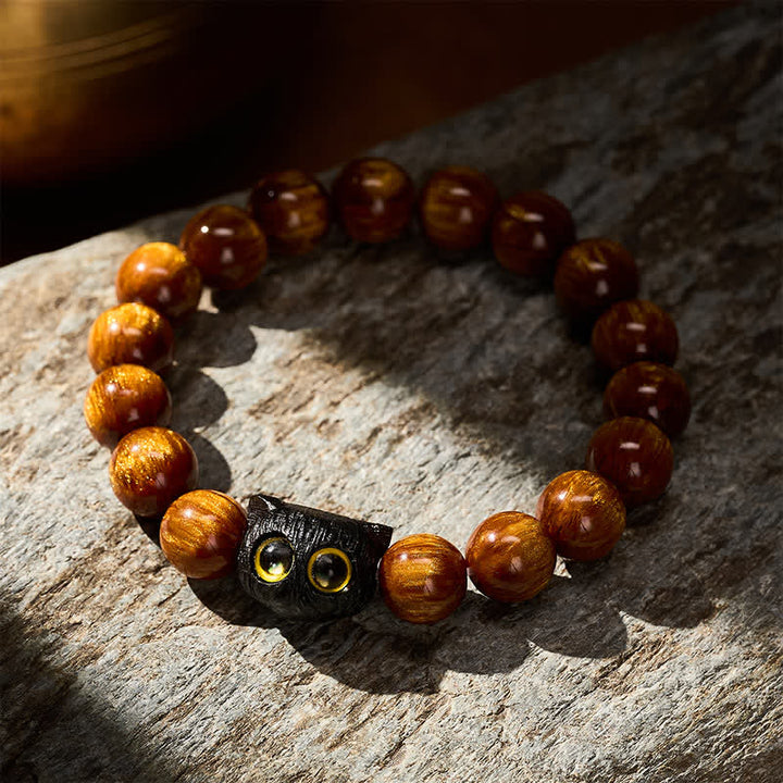 Buddha Stones Armband aus gelben Harzperlen und Ebenholz mit Katzenmotiv - image 11