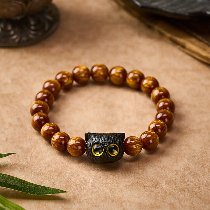 Buddha Stones Armband aus gelben Harzperlen und Ebenholz mit Katzenmotiv - image 1