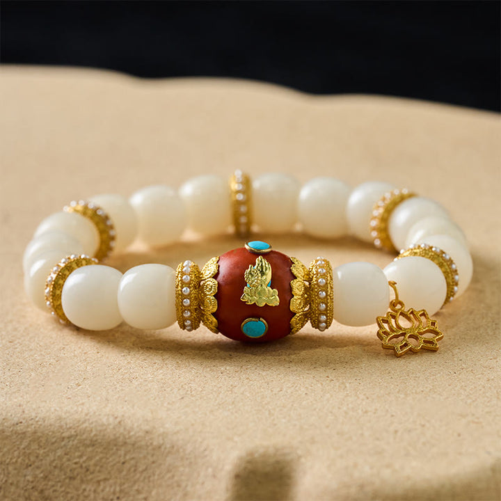 Buddha Stones Armband mit weißem Bodhi-Samen, graviertem orangefarbenem ovalem Lotus-Anhänger und Segensperlen - image 1