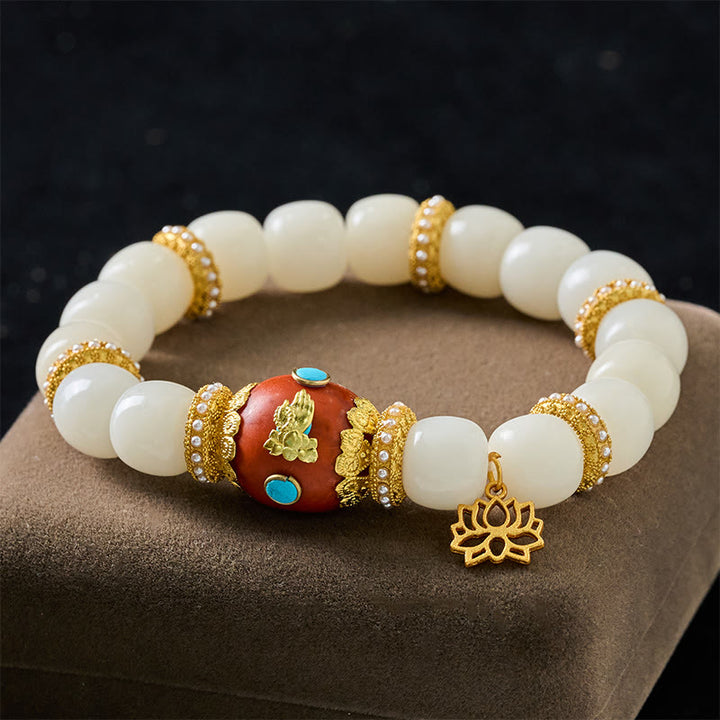 Buddha Stones Armband mit weißem Bodhi-Samen, graviertem orangefarbenem ovalem Lotus-Anhänger und Segensperlen - Weiße Bodhi-Samen (Handgelenkumfang: 18-19 cm) - image 0