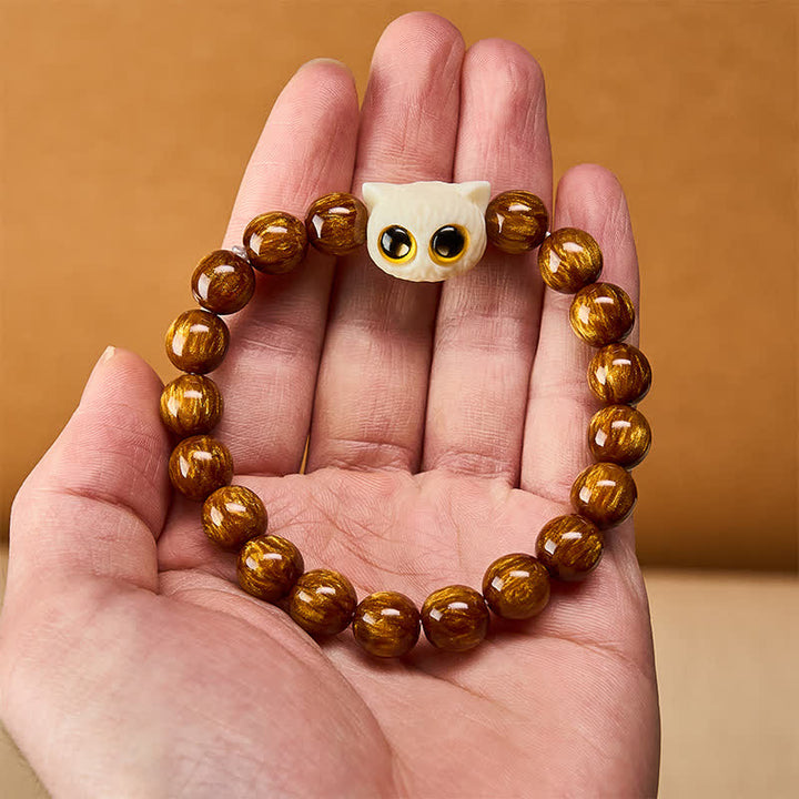Buddha Stones Armband mit gelben Harzperlen, elfenbeinfarbenen Früchten und Katzenmotiven - image 5