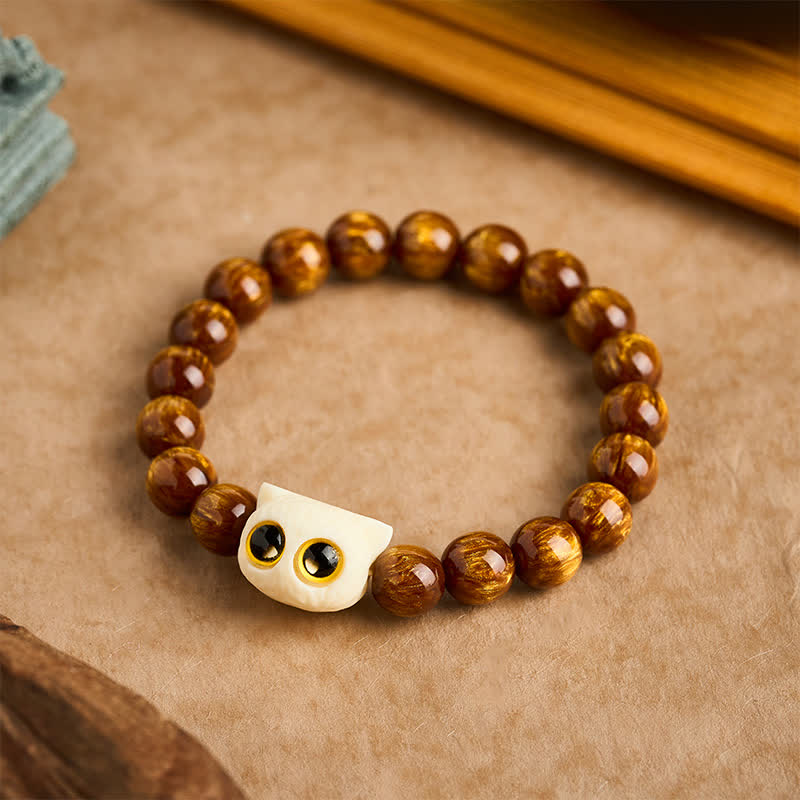 Buddha Stones Armband mit gelben Harzperlen, elfenbeinfarbenen Früchten und Katzenmotiven - image 1
