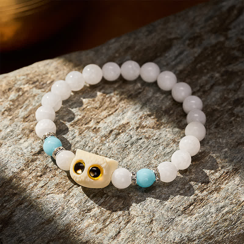 Buddha Stones Armband aus schwarzem Obsidian und weißem Chalcedon mit Katzenkopf-Reinheitsperle und großen Augen - image 8