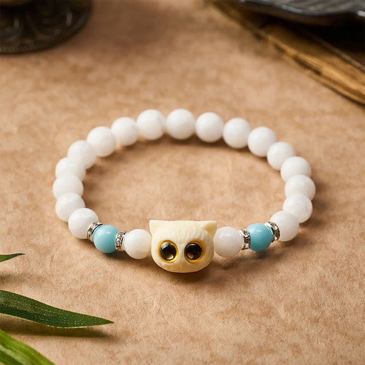 Buddha Stones Armband aus schwarzem Obsidian und weißem Chalcedon mit Katzenkopf-Reinheitsperle und großen Augen - image 3