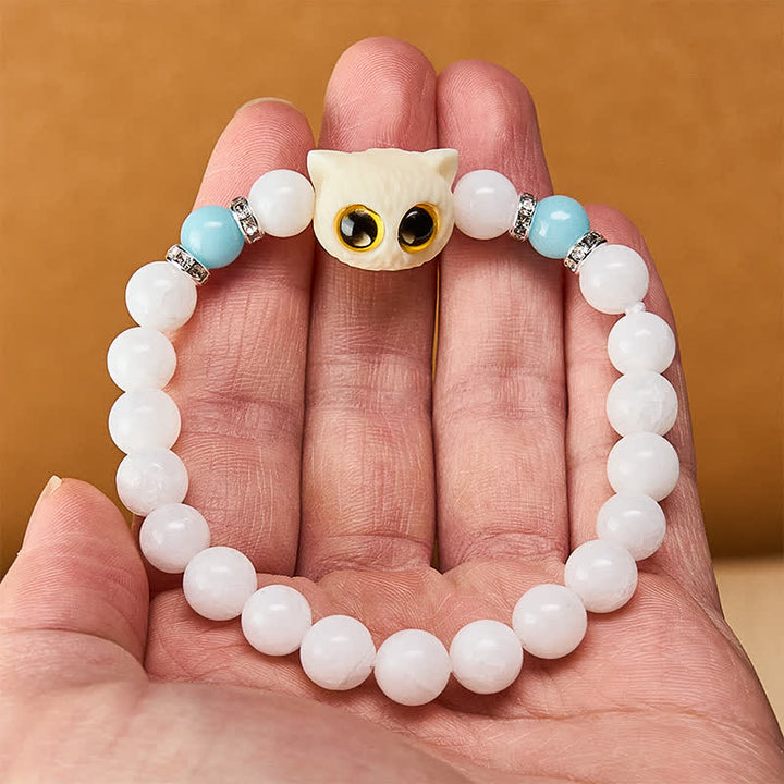 Buddha Stones Armband aus schwarzem Obsidian und weißem Chalcedon mit Katzenkopf-Reinheitsperle und großen Augen - image 5