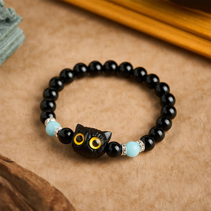 Buddha Stones Armband aus schwarzem Obsidian und weißem Chalcedon mit Katzenkopf-Reinheitsperle und großen Augen - image 16