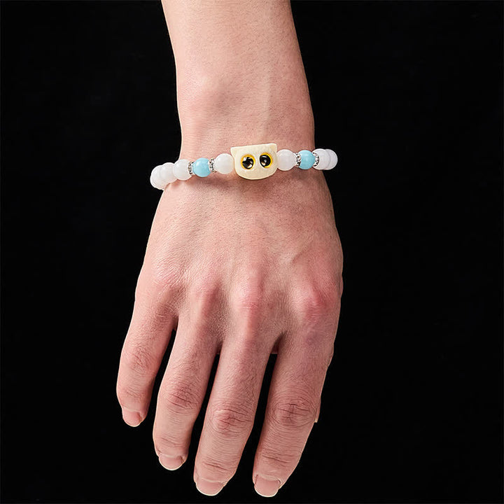 Buddha Stones Armband aus schwarzem Obsidian und weißem Chalcedon mit Katzenkopf-Reinheitsperle und großen Augen - image 5