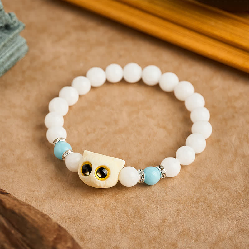 Buddha Stones Armband aus schwarzem Obsidian und weißem Chalcedon mit Katzenkopf-Reinheitsperle und großen Augen - image 2