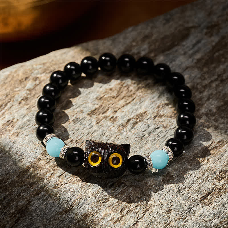 Buddha Stones Armband aus schwarzem Obsidian und weißem Chalcedon mit Katzenkopf-Reinheitsperle und großen Augen - image 21