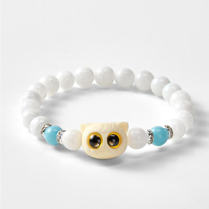 Buddha Stones Armband aus schwarzem Obsidian und weißem Chalcedon mit Katzenkopf-Reinheitsperle und großen Augen - image 10