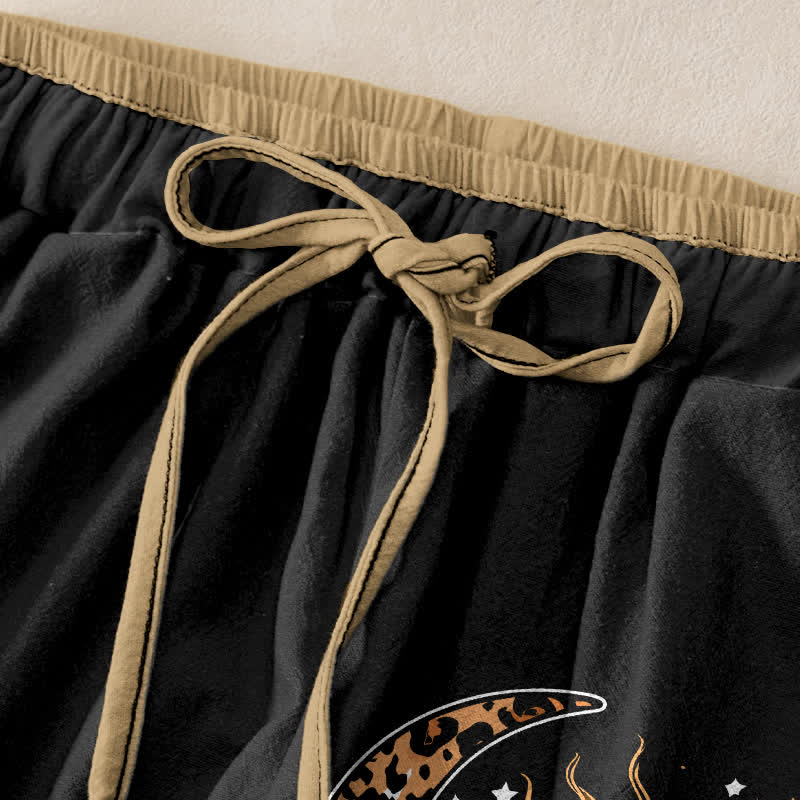 Buddha Stones Damenhose aus reiner Baumwolle mit himmlischem Sonne- und Mondmuster, elastischem Bund und Taschen - image 1