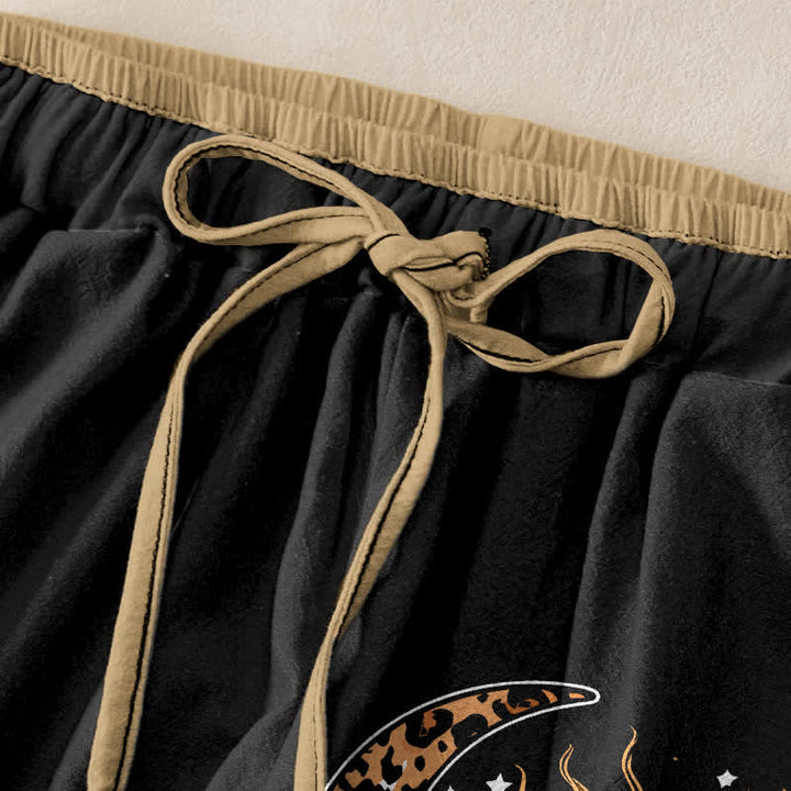 Buddha Stones Damenhose aus reiner Baumwolle mit himmlischem Sonne- und Mondmuster, elastischem Bund und Taschen - image 1